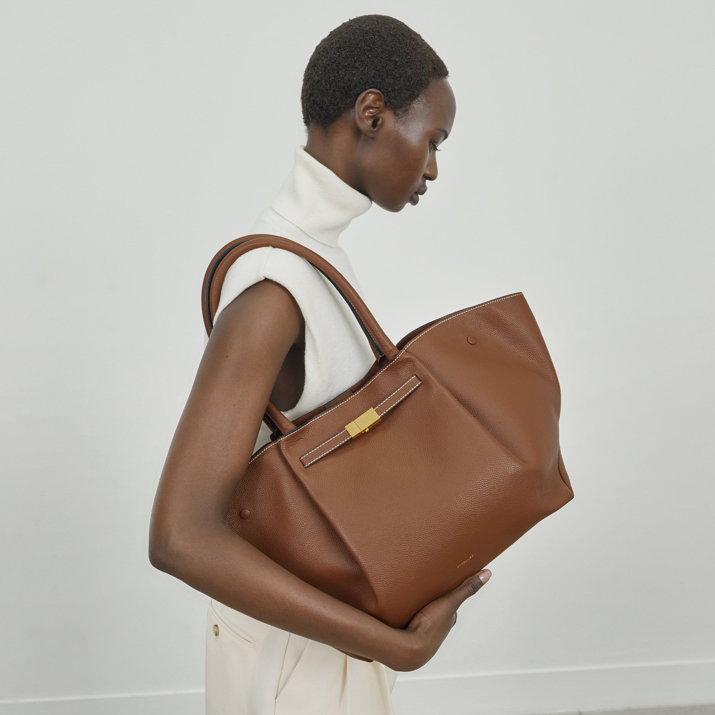 The New York - tan small grain ecru stitching