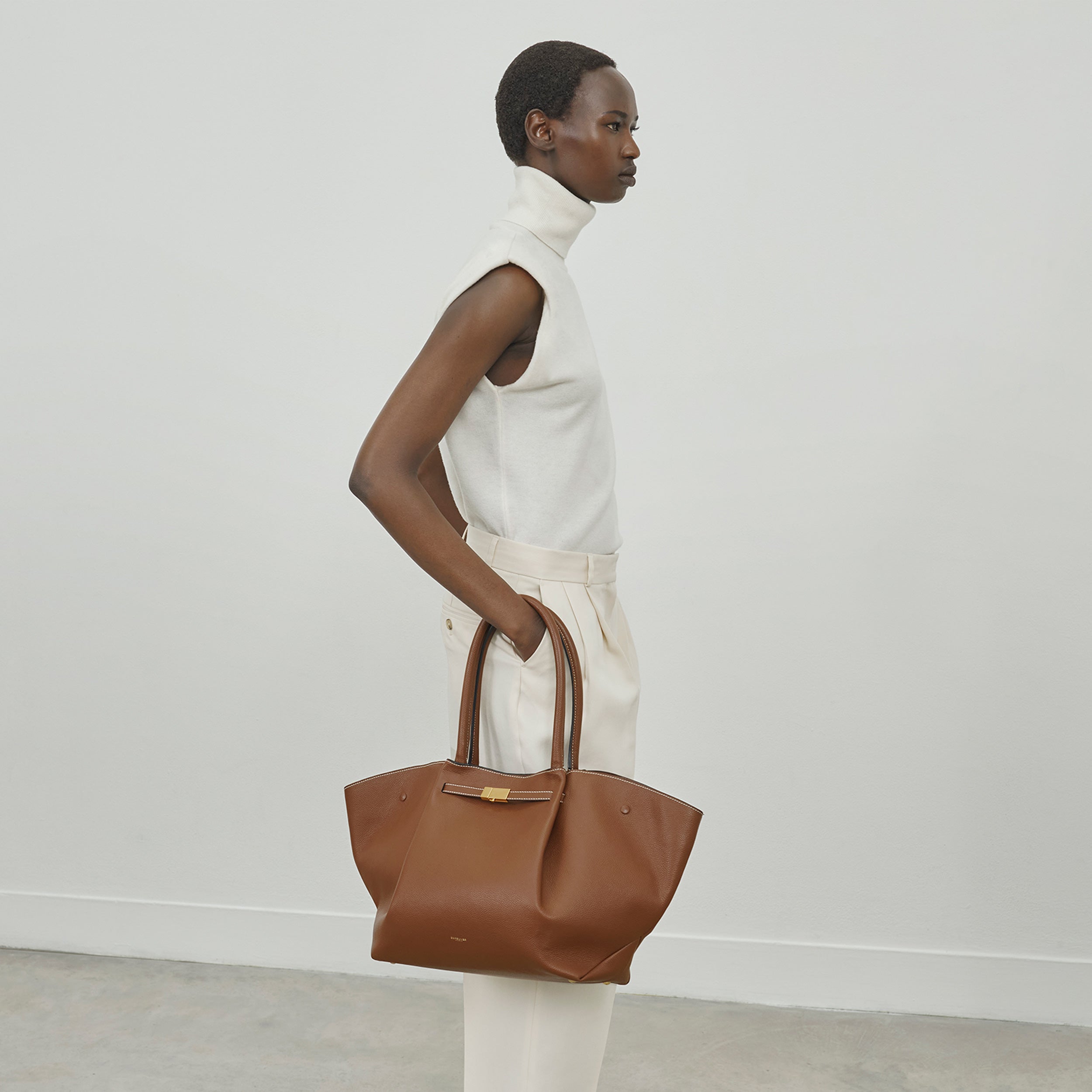 The New York - tan small grain ecru stitching