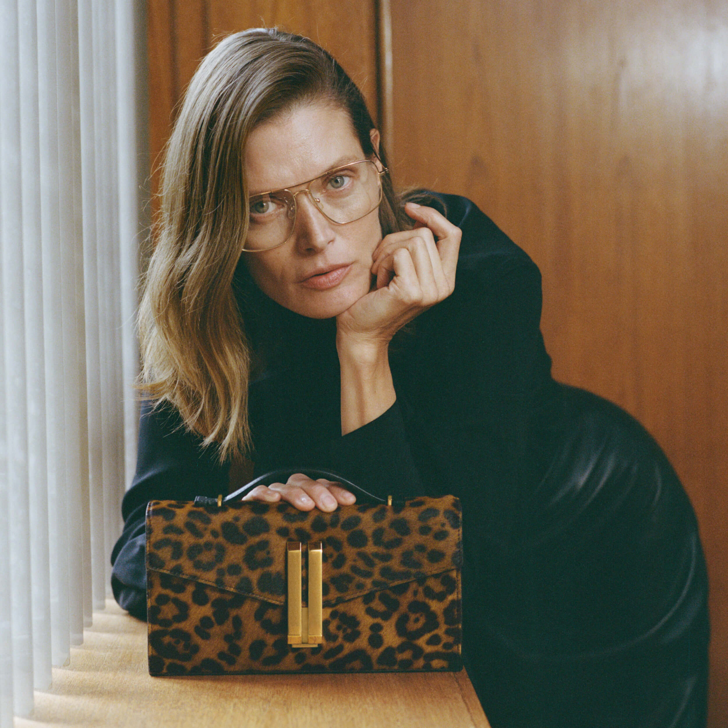 The Vancouver Clutch - leopard-effect calf hair & black smooth